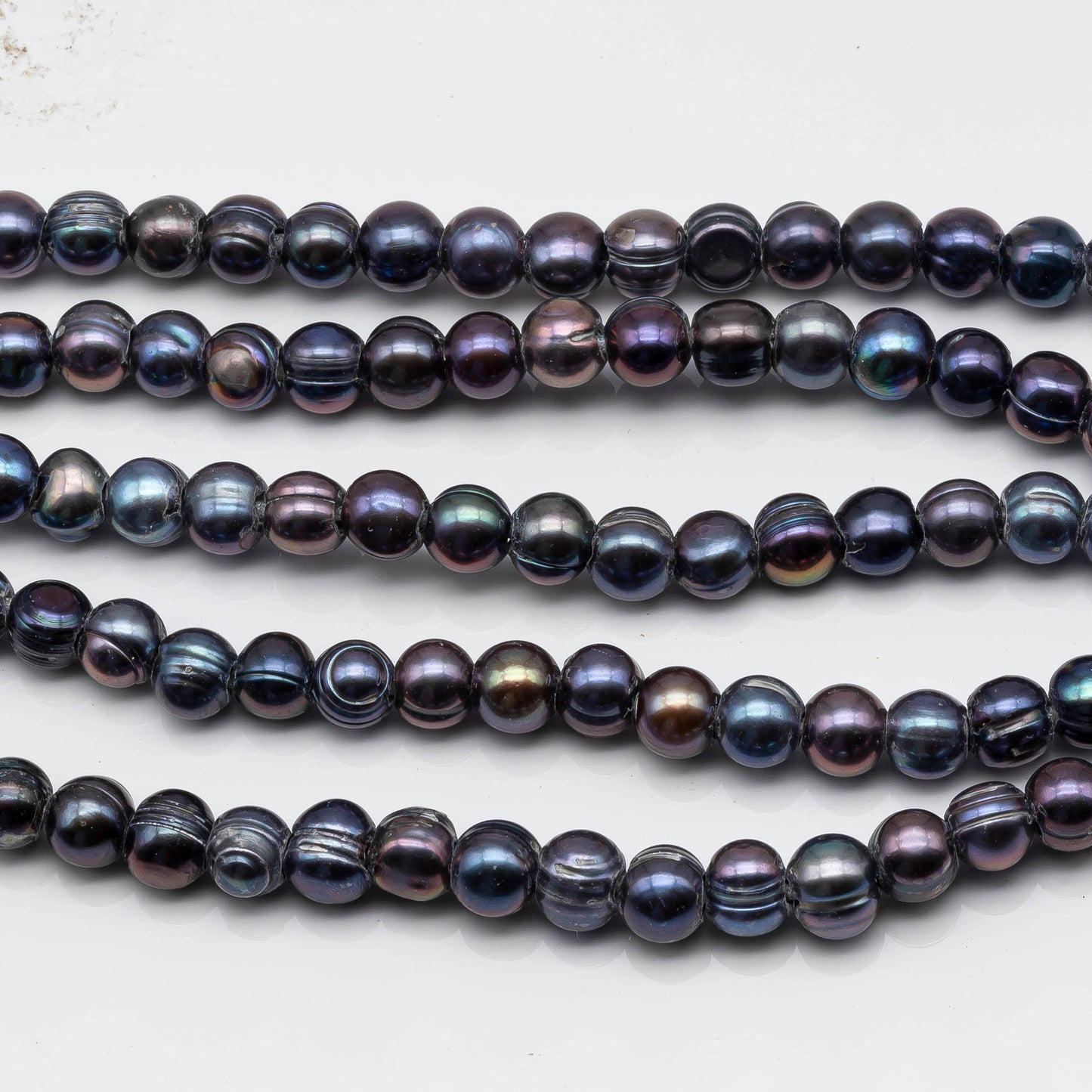 7-8mm Peacock Blue Large Hole Pearl with Lines in Potato Shape with 2.5mm Hole in 8 Inch Stand for Jewelry Making, SKU # 1579FW