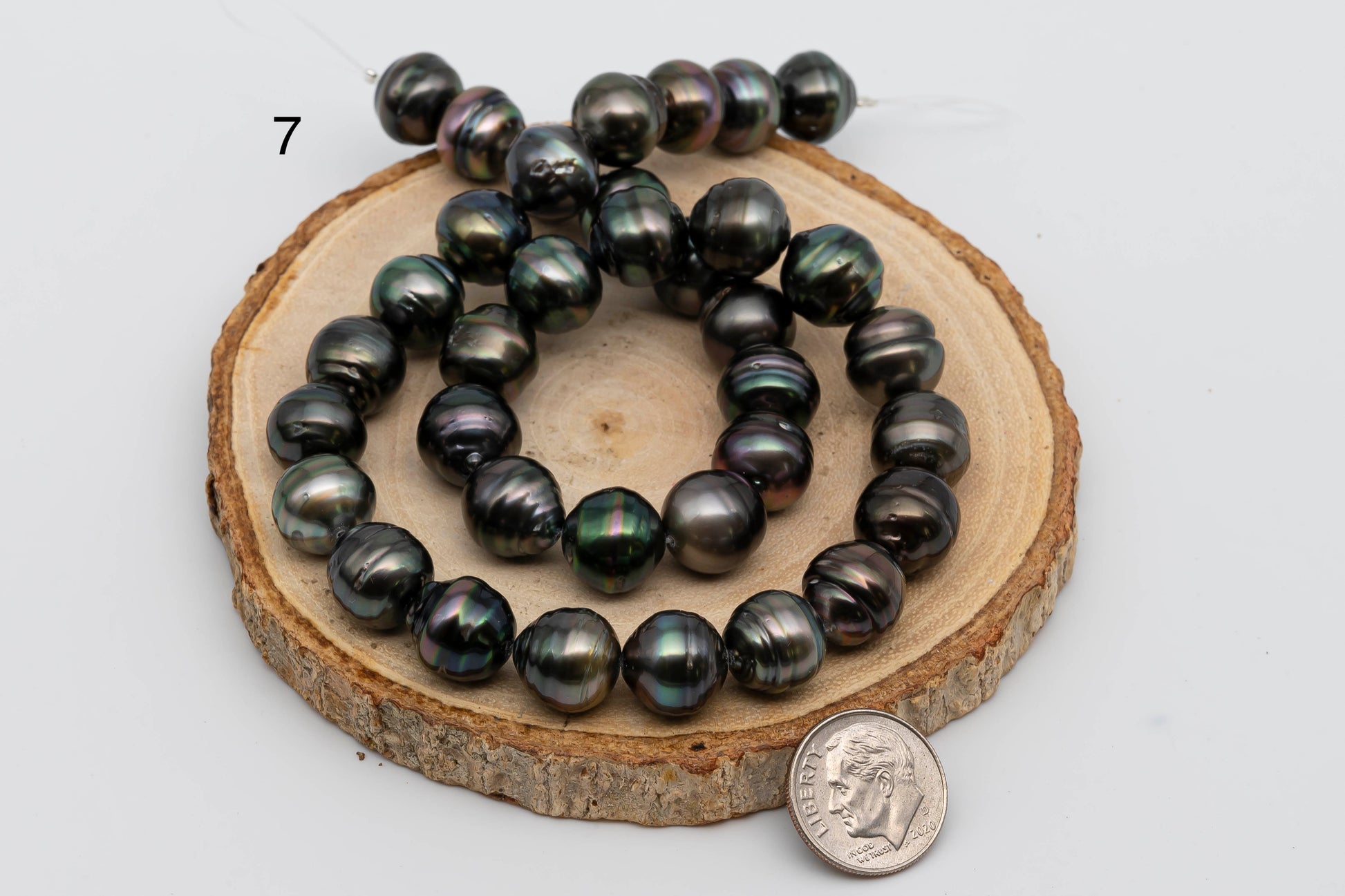 Displaying item number 7, Tahitian Pearl near round in full strand.