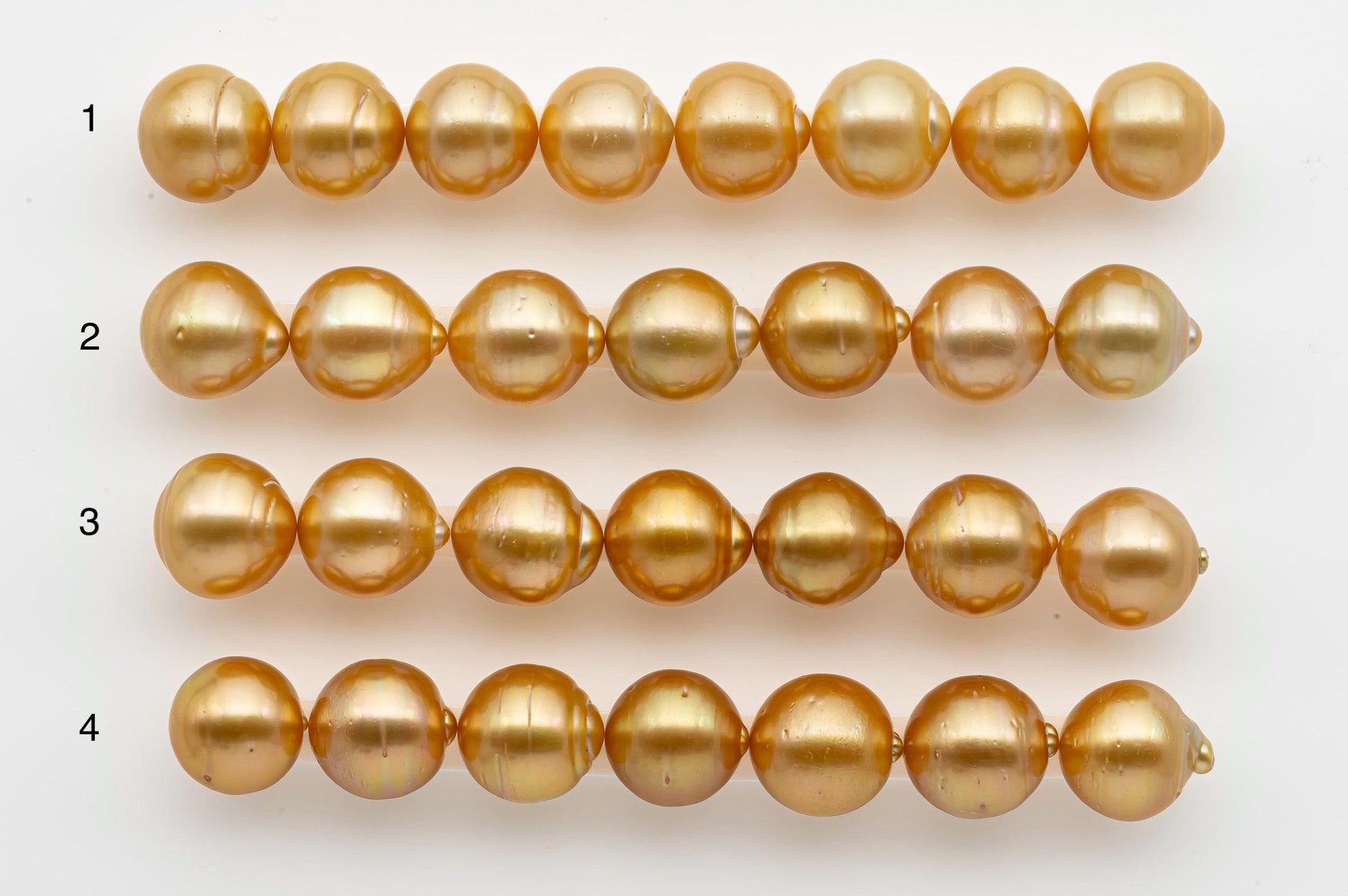 4 strands of 14-15mm Golden South Sea Pearls strands to choose from.