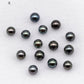 Loose round Tahitian pearl in blue or green color with blemishes 