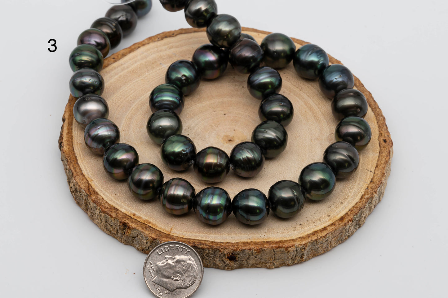 Displaying item number 3, Tahitian Pearl near round in full strand.