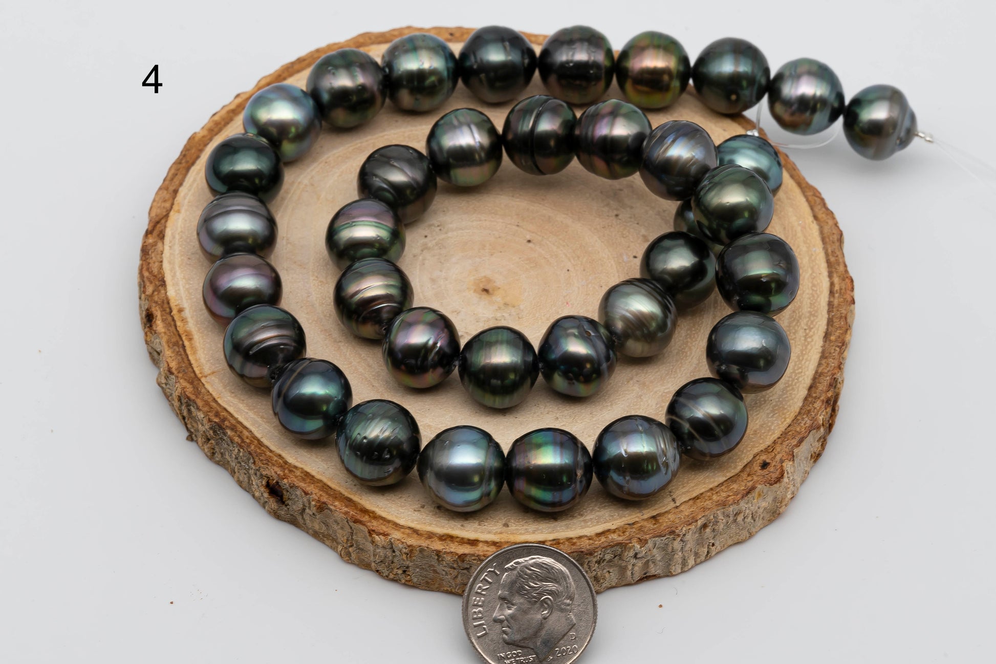 Displaying item number 4, Tahitian Pearl near round in full strand.