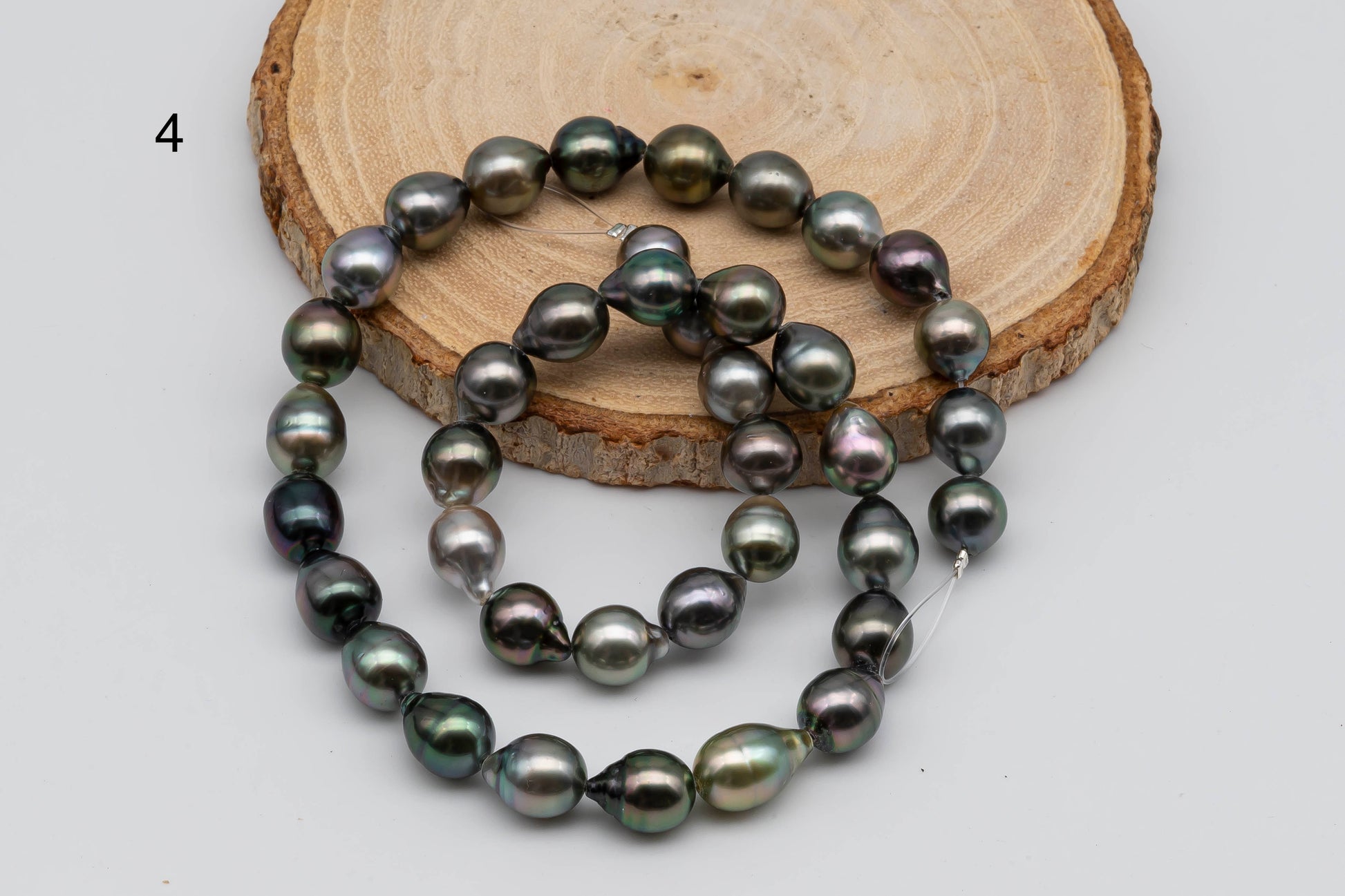 4th strand of drop Tahitian Pearl in multi colors.