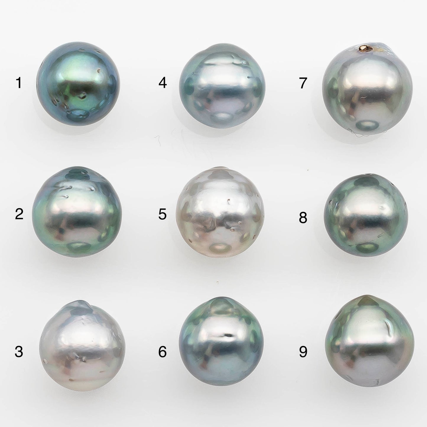 10-11mm Tahitian Pearl with High Luster and Natural Color in Silver Blue with Minor Blemishes, Loose Single Piece Undrilled, SKU # 2362TH