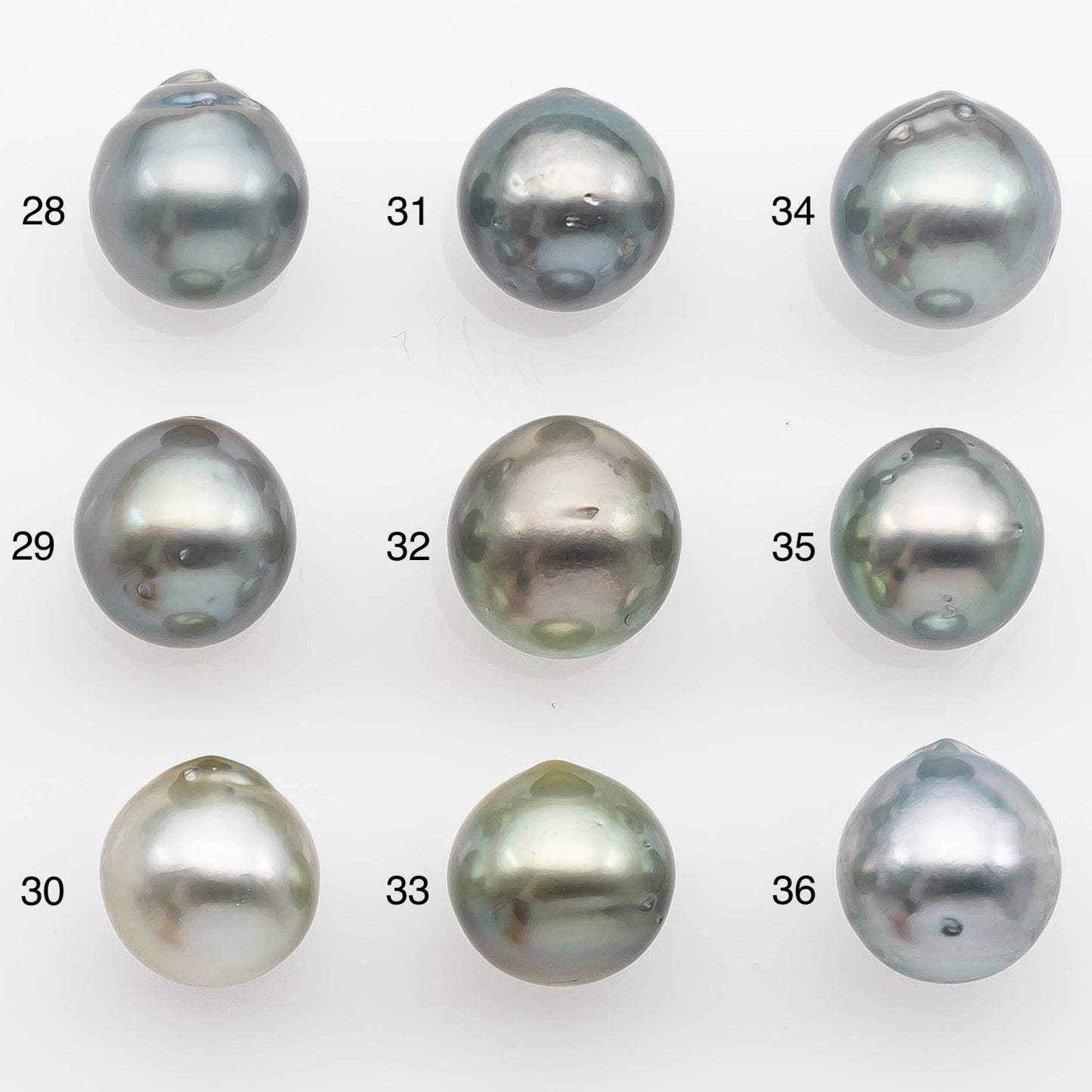 10-11mm Tahitian Pearl with High Luster and Natural Color in Silver Blue with Minor Blemishes, Loose Single Piece Undrilled, SKU # 2362TH