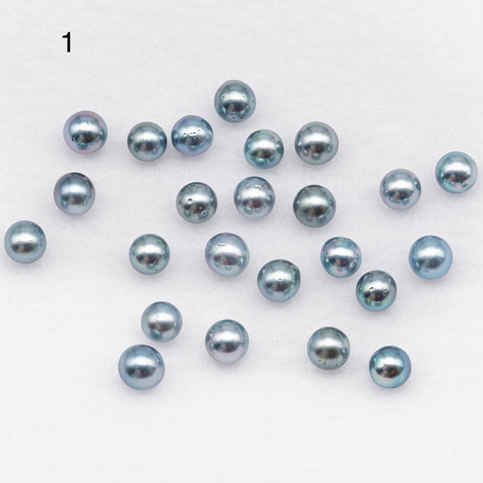 Picture 1 with Loose Tahitian Pearl  round shape in silver blue overtone with blemishes