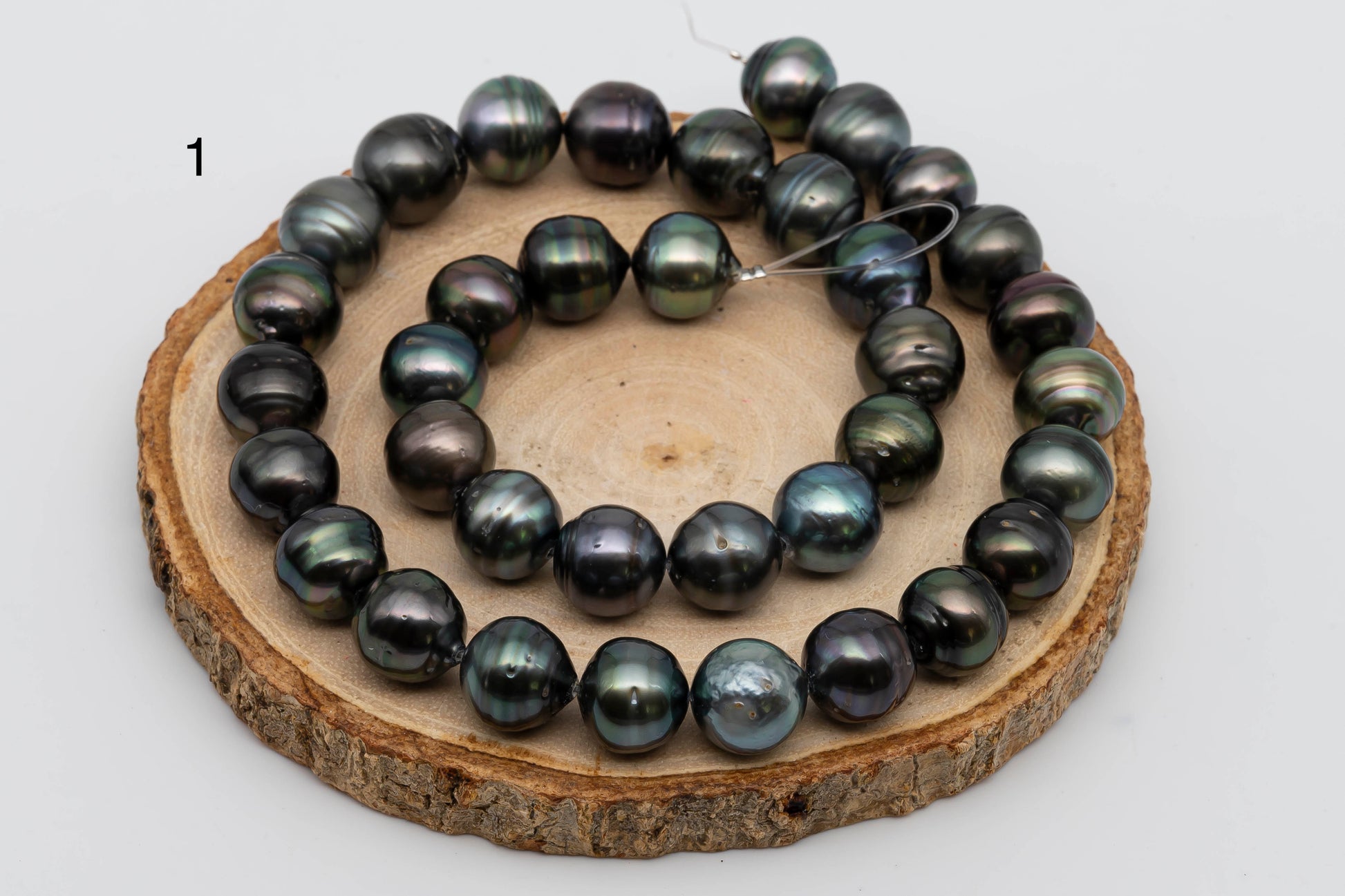 Displaying item number 1, Tahitian Pearl near round in full strand.