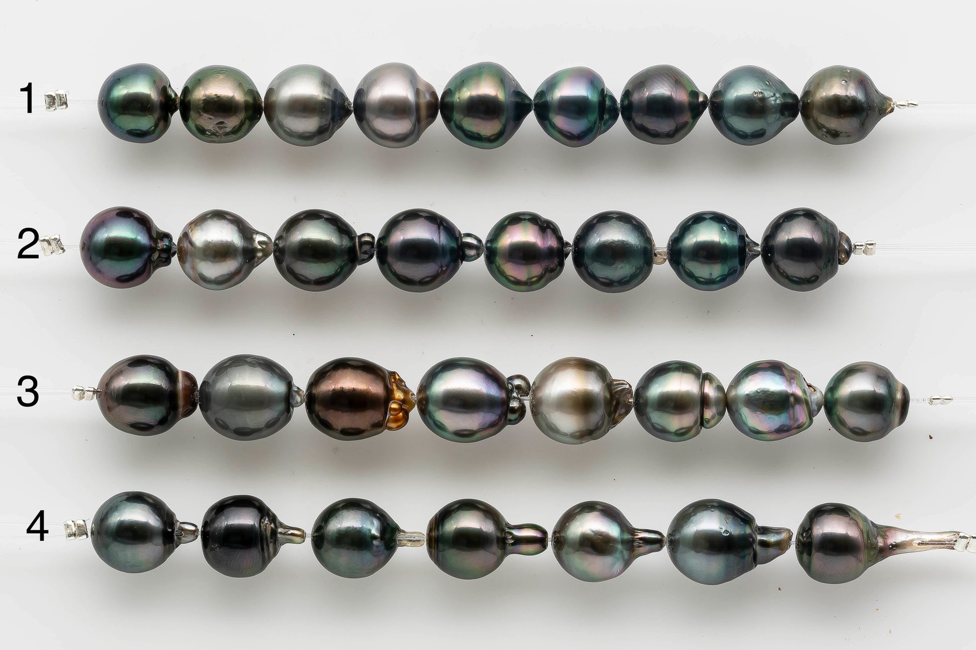 Displaying 4 strands of Tahitian Pearl to choose from.